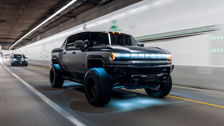 HUMMER EV driving through a tunnel