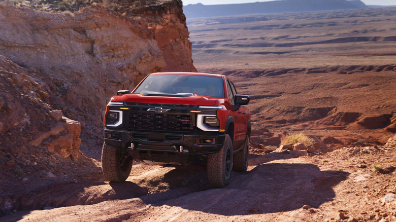 2027 Chevrolet Silverado 1500 with ZR2 trim driving off road