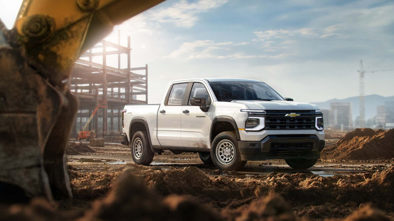 2027 Chevrolet Silverado 1500 with Work Truck trim parked in a construction area