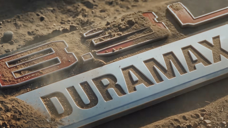 Dust over a 8.3-liter Duramax logo board