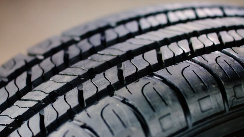 The tread of a Goodyear Assurance All-Season tire.