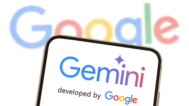 Gemini logo on a smartphone with blurred Google written in background