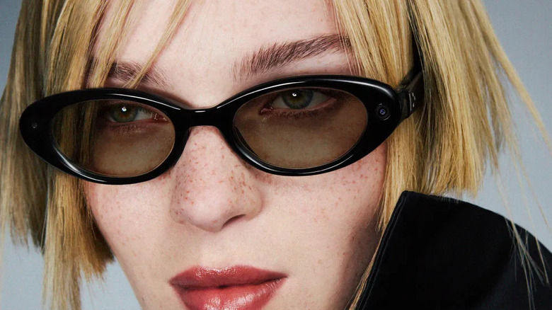 A woman wearing the upcoming Google XR glasses
