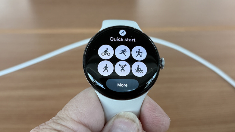 Man holding a Pixel Watch 4
