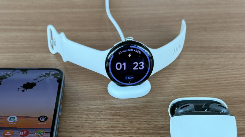 Pixel Watch 4, Pixel 10 Pro Fold and Pixel Buds 2a on a table