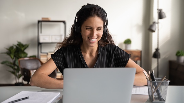 Smiling computer worker