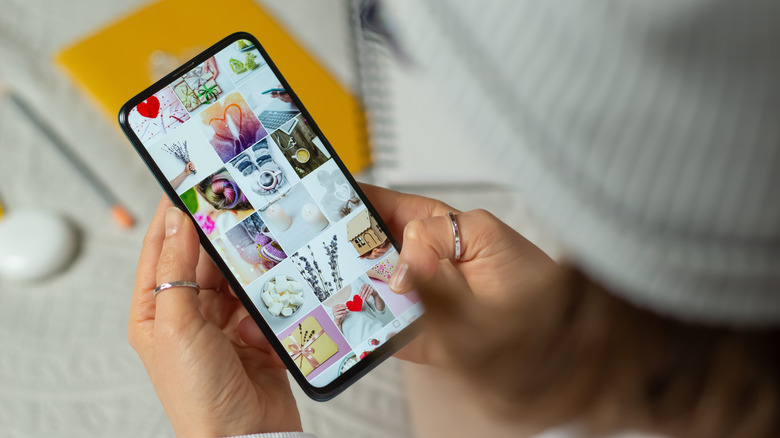 Woman looking through her photo gallery