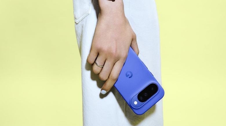 An image of a person holding the Pixel 10 smartphone