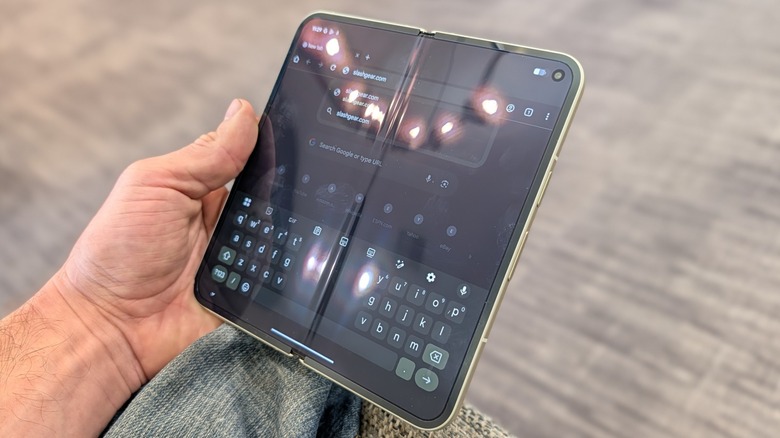 Google Pixel 10 Pro Fold held by human hand.