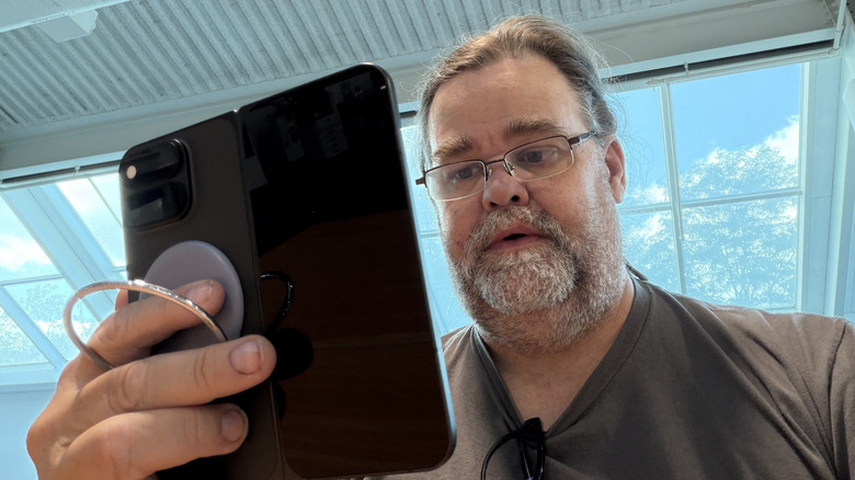 Man holding the Pixel 11 Pro Fold
