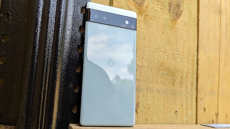 Google Pixel 6a on fence