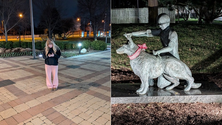 Woman standing in the dark and a statue of a dog