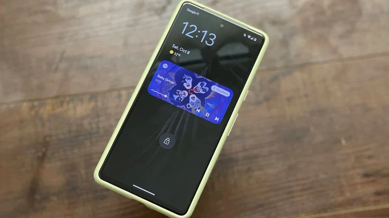 Pixel 7 phone with Spotify playing
