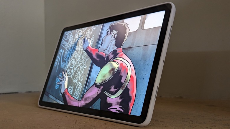 Google Pixel tablet with comic panel on screen