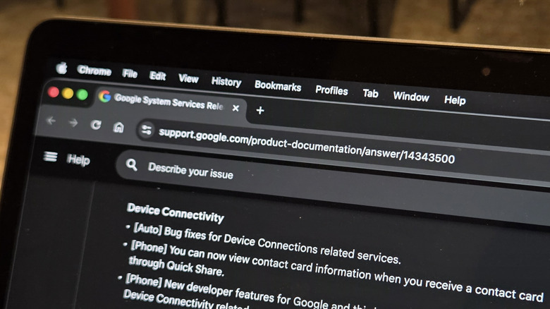 A laptop displays the latest changelog for Google Play Services
