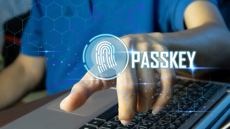 Person using their fingerprint as a passkey