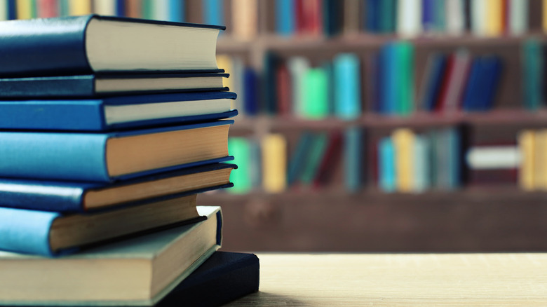 Pile of books in a library
