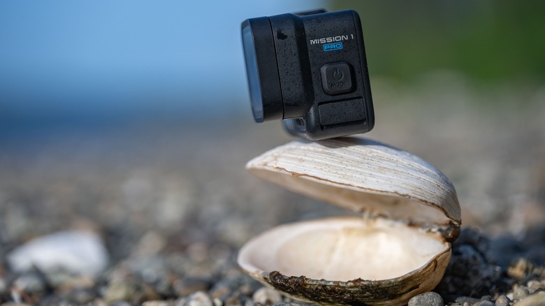 The GoPro Mission 1 Pro balanced on top of a clam shell.