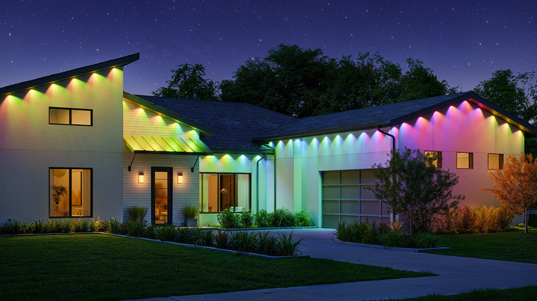 A home with the Govee Outdoor Permanent Lights Prism in rainbow colors.