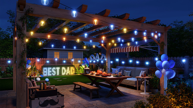 Govee-lit patio with Best Dad sign