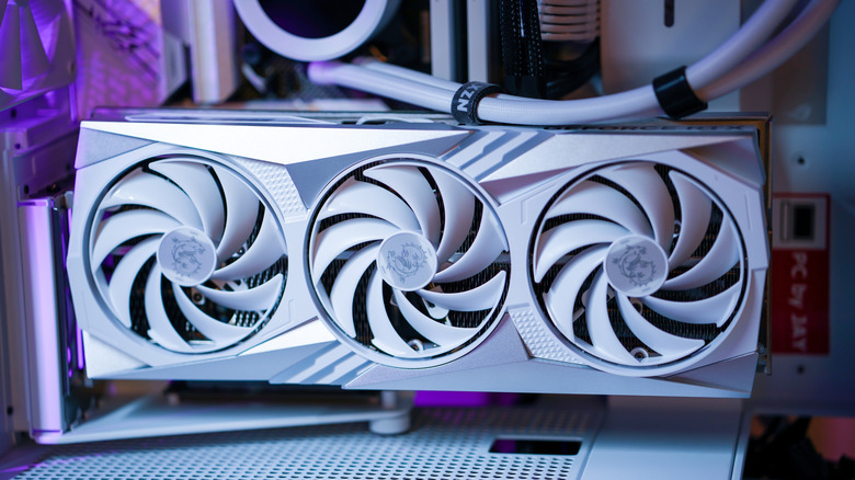 Close up of desktop PC tower showing GPU fans