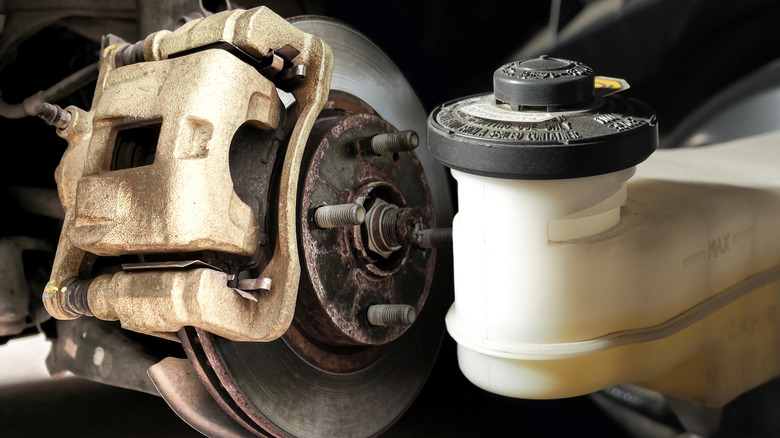 Close up image of brakes and brake fluid reservoir