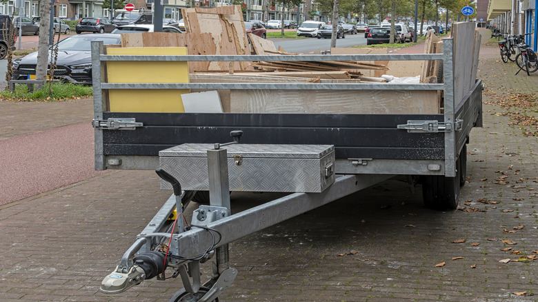 a trailer filled up with waste