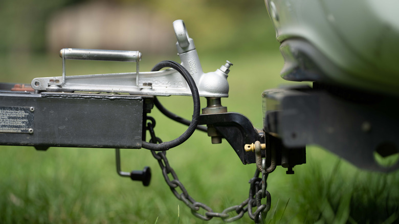 car and trailer hooked properly closeup