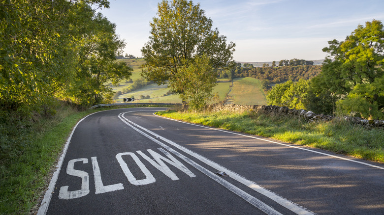 slow sign on rural road