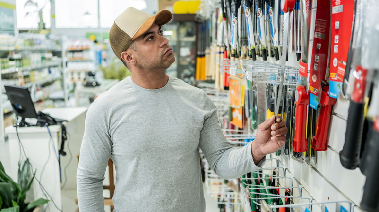 Person looking at items in a hardware store