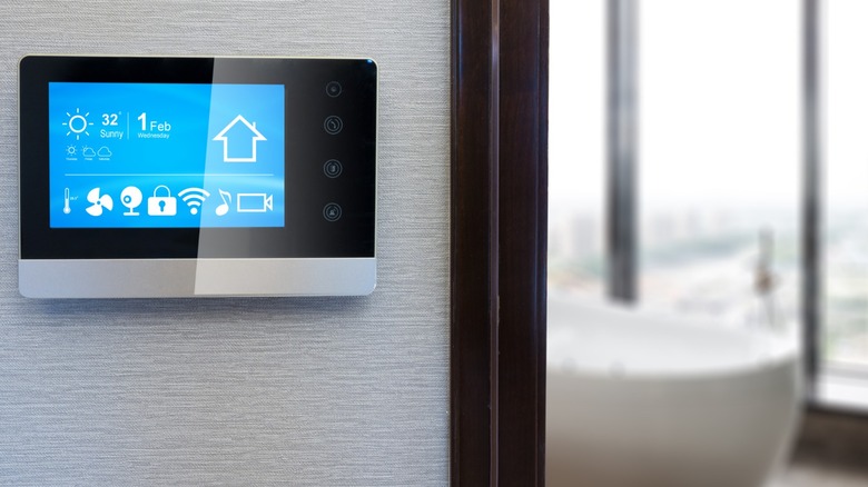 A smart switch and hub installed in a bathroom