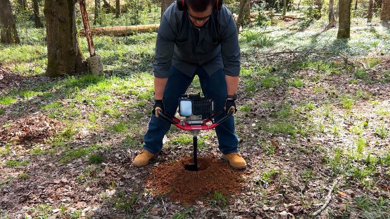 Predator earth auger in action