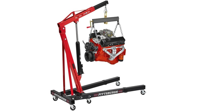 shop crane carrying engine