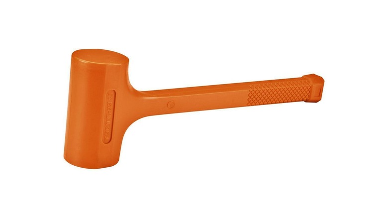 an orange dead blow hammer