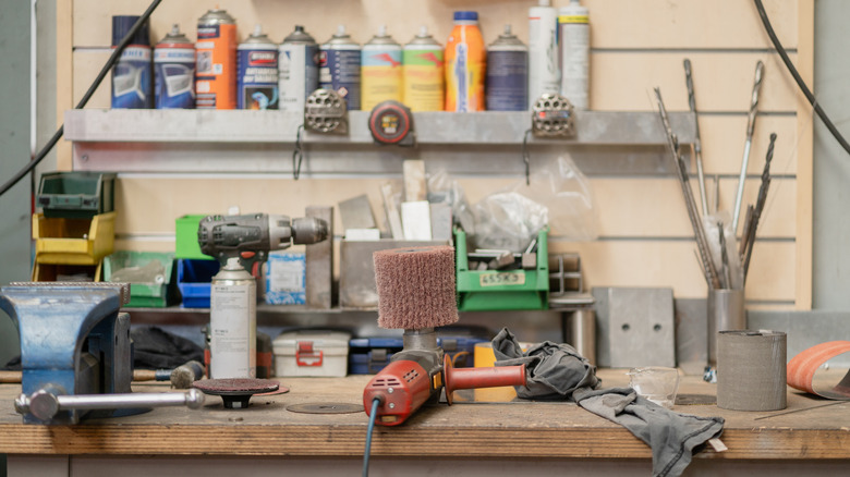 Cluttered workbench in a workshop