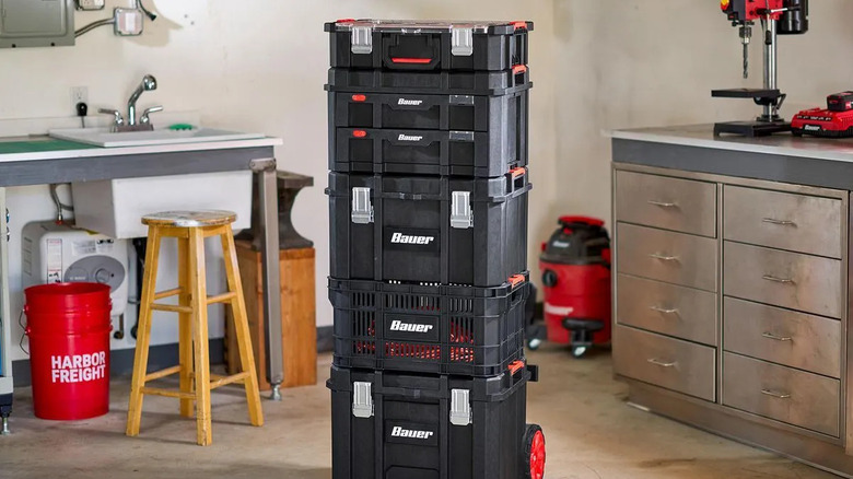 The Bauer modular storage organizer atop a stack of Bauer crates and tool boxes
