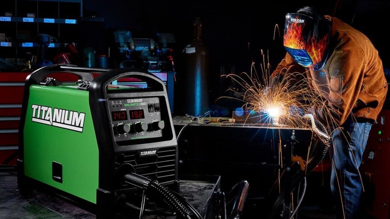 Welder wearing Vulcan welding mask using Titanium welder