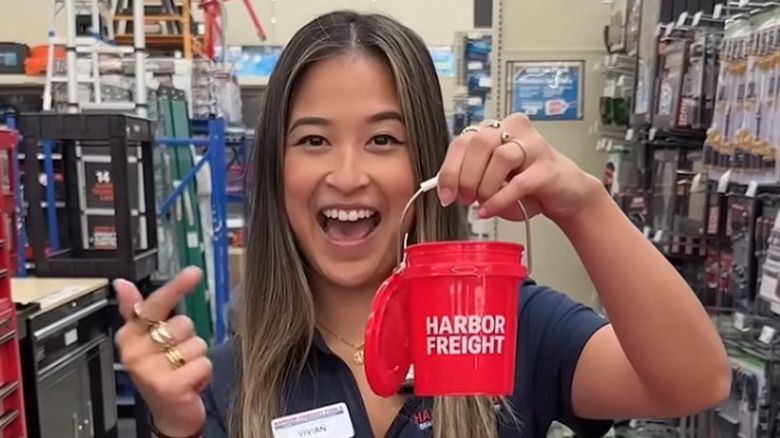 Woman holding mini Harbor Freight bucket