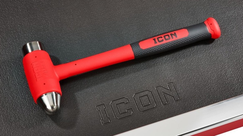 Icon 40-ounce ball peen dead-blow hammer on an Icon mat