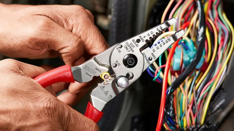 Icon 9-inch long-nose wire stripper, cutter, and crimper in use