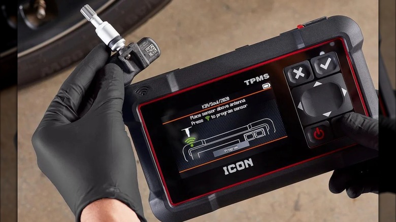 Icon Professional Tire Pressure Monitoring System (TPMS) tool kit in use