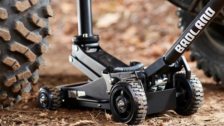 Harbor Freight off-road jack holding up a truck