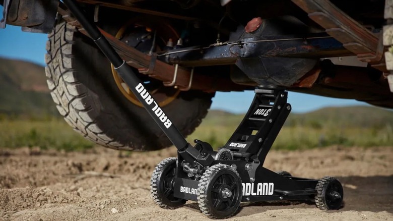 Harbor Freight off-road jack holding up a truck