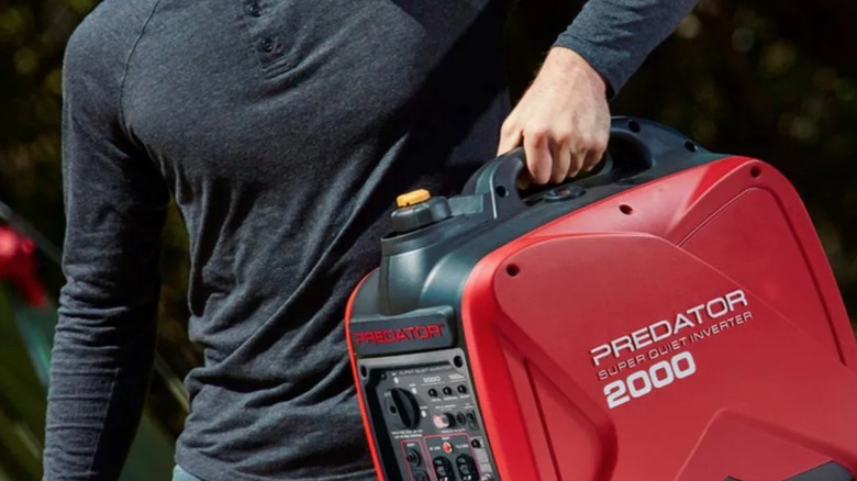 Person Carrying Harbor Freight Predator 2000 Power Station