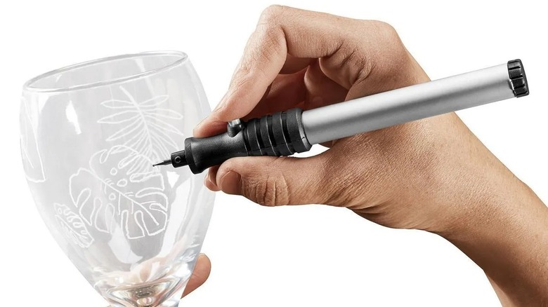 Warrior Cordless Micro Engraver with Diamond-Tipped Ballpoint used to design wineglass