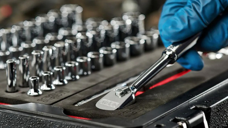Man grabbing tool from Icon 48-piece set