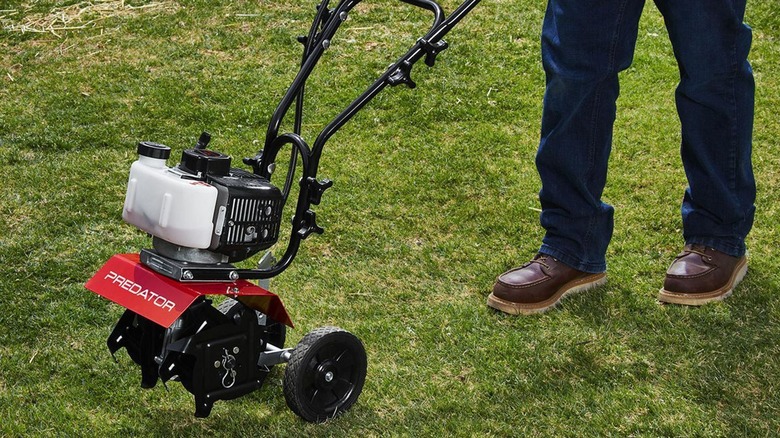 Predator cultivator on grass