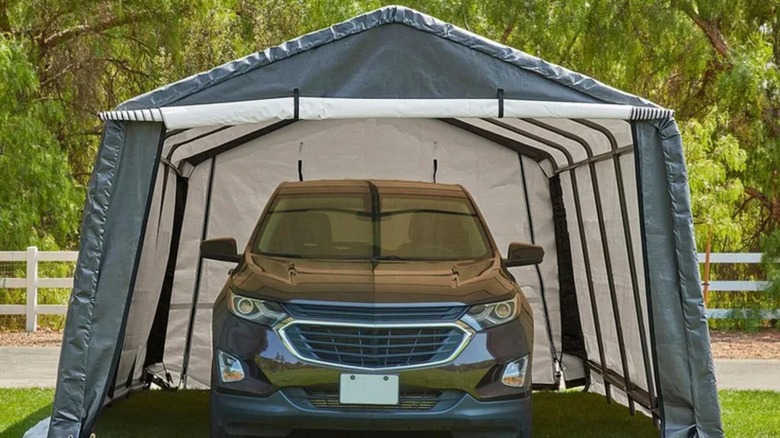 car inside CoverPro portable garage
