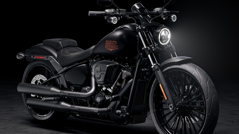 Studio photo of blacked-out Harley-Davidson Breakout in front of a black backdrop