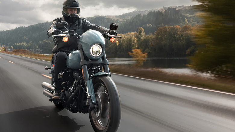 Man riding Harley-Davidson motorcycle